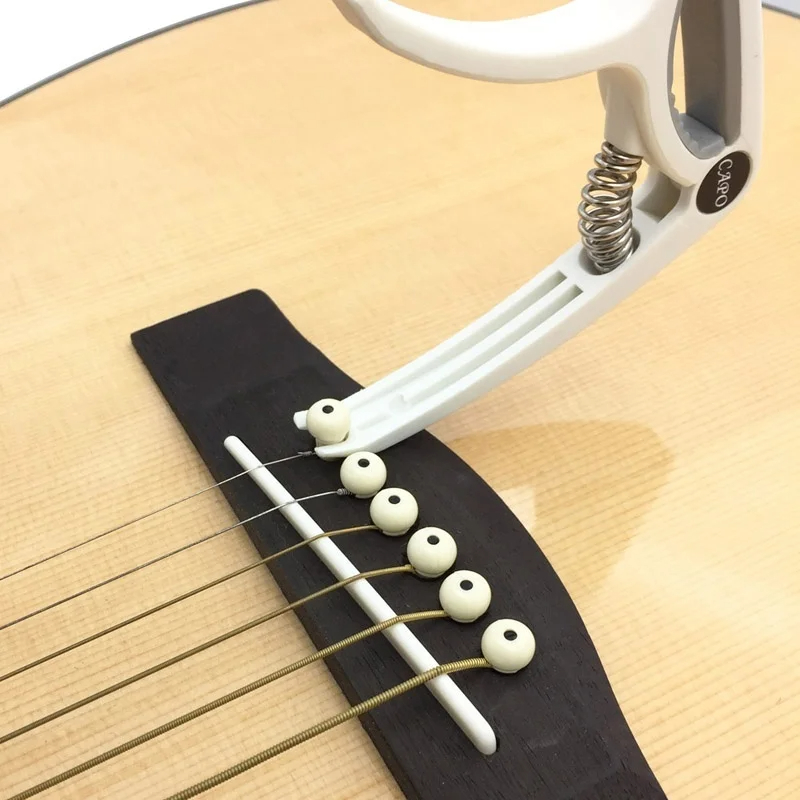 プラスチックギターカポ 6 弦アコースティッククラシックエレ - Guitar Capo Clip のレビューと価格